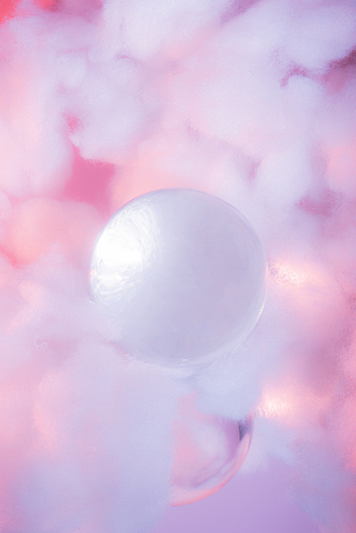 White Sphere with Clouds on Pastel Pink Background